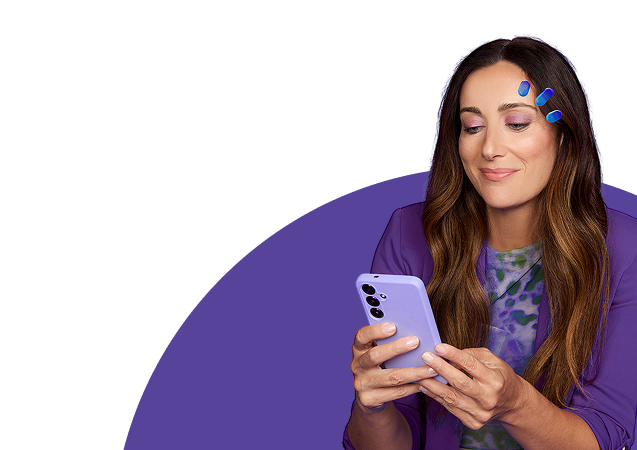 Woman in purple holding eye drops